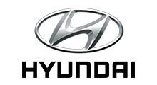 Hyundai logo: silver oval surrounding stylized 