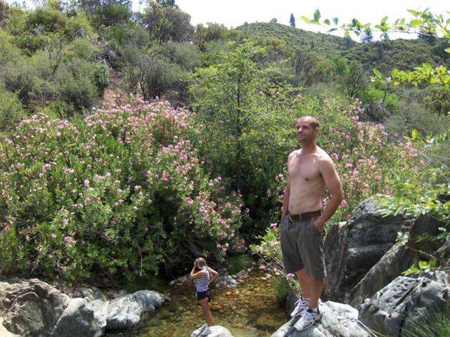 Man standing beside the river