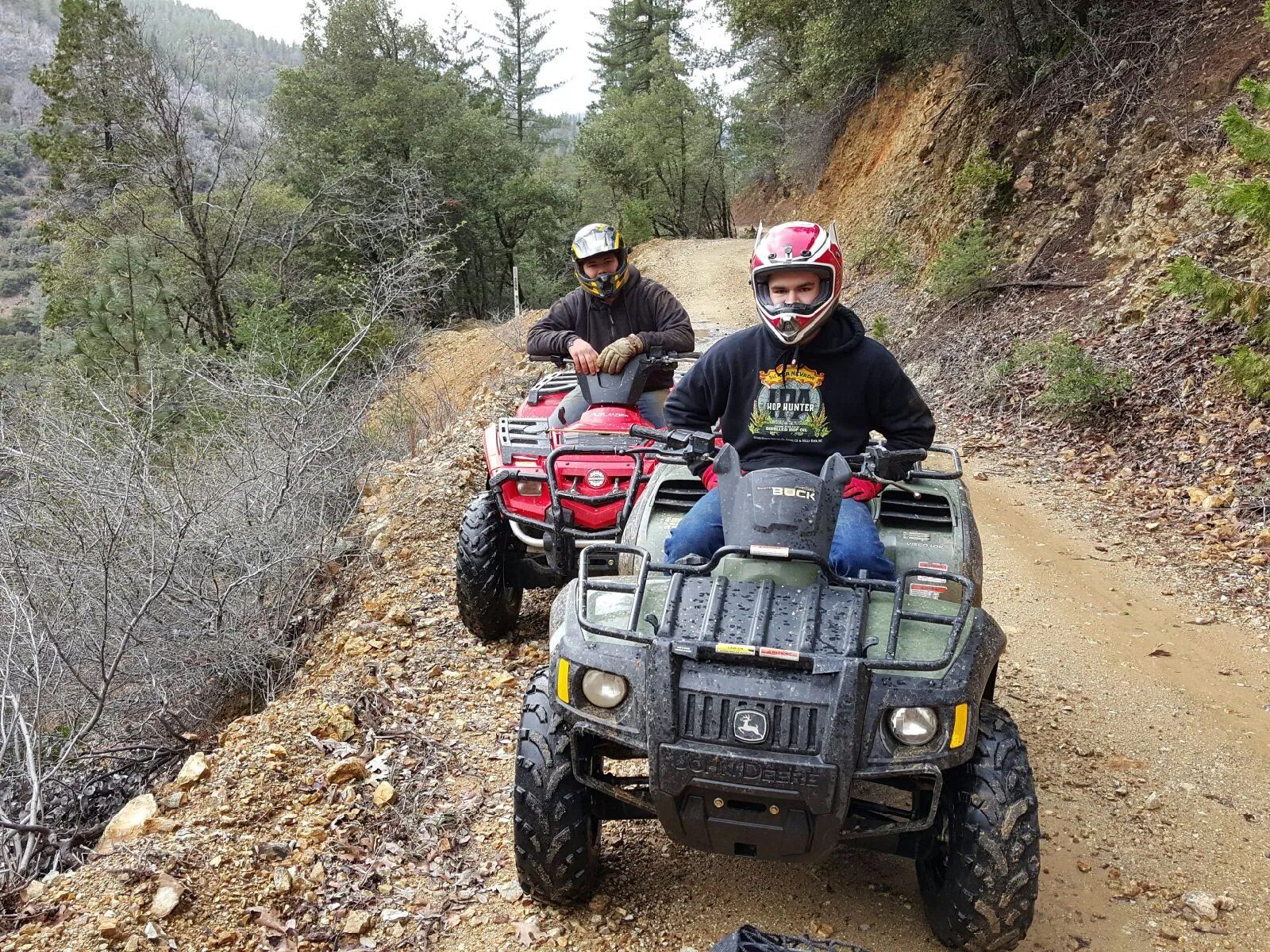 Men riding on ATV
