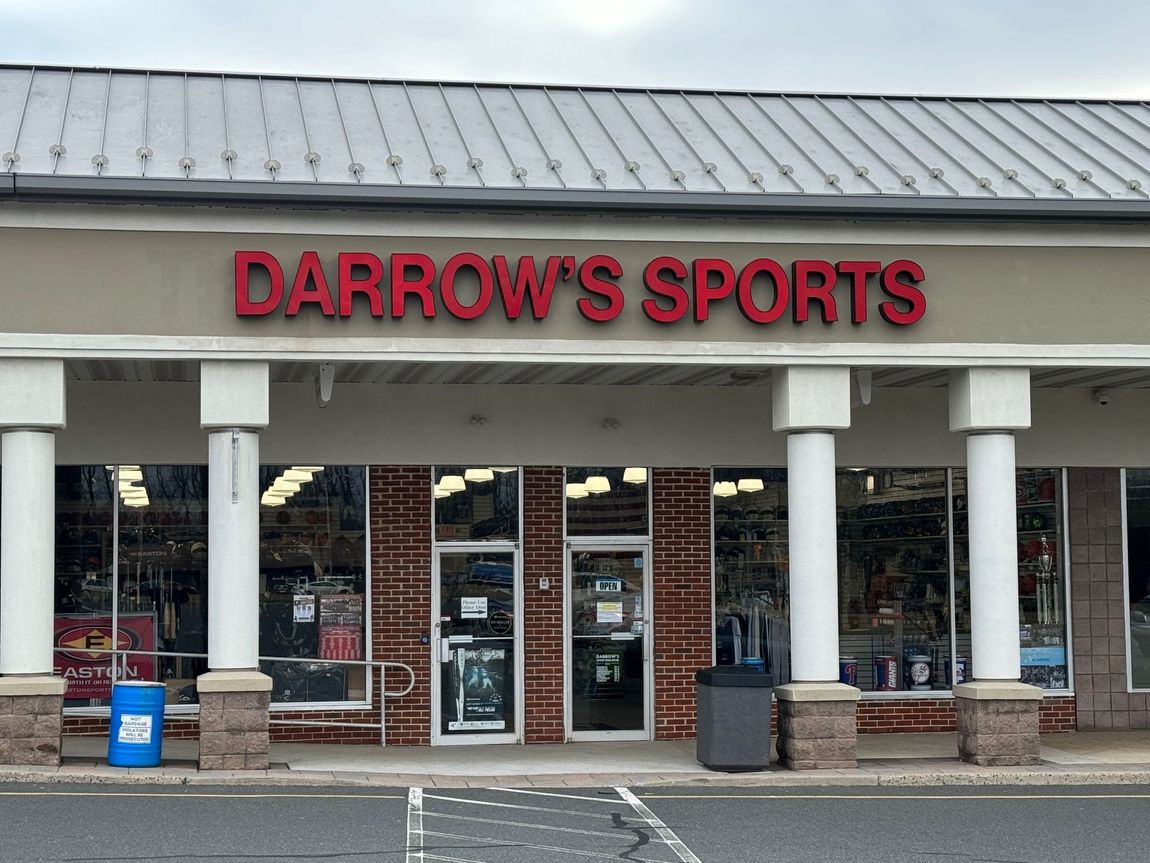 the front of a store called darrow 's sports