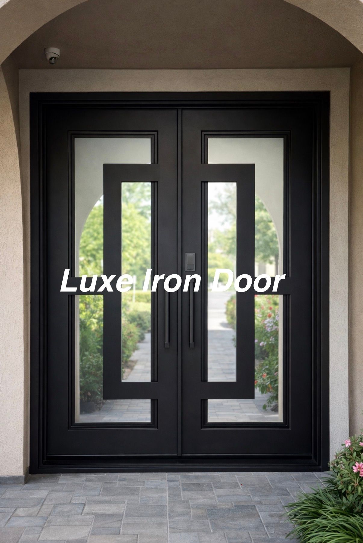 Black double front door with tall glass panels under a stone archway