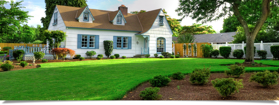 Large house with impeccable lawn care