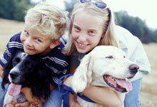 Kids with loyal dogs