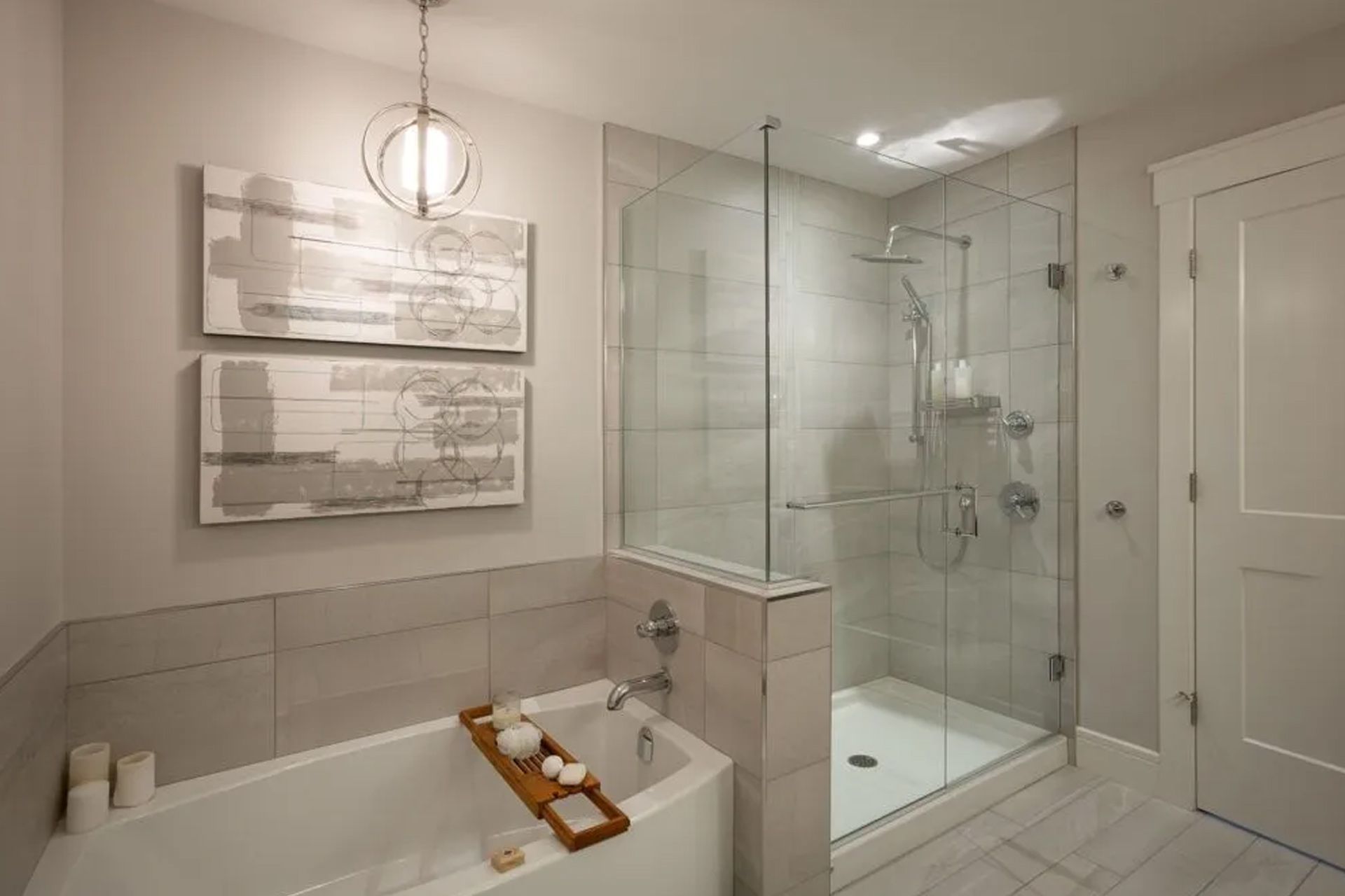 a bathroom with a bathtub and a walk in shower