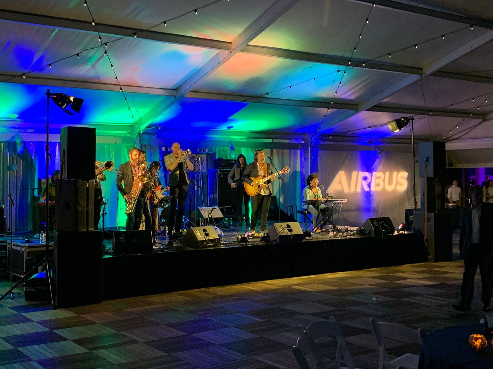 A band playing music for the crowd