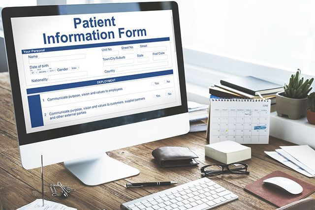 Computer showing Patient Forms