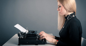 Woman using the type writer