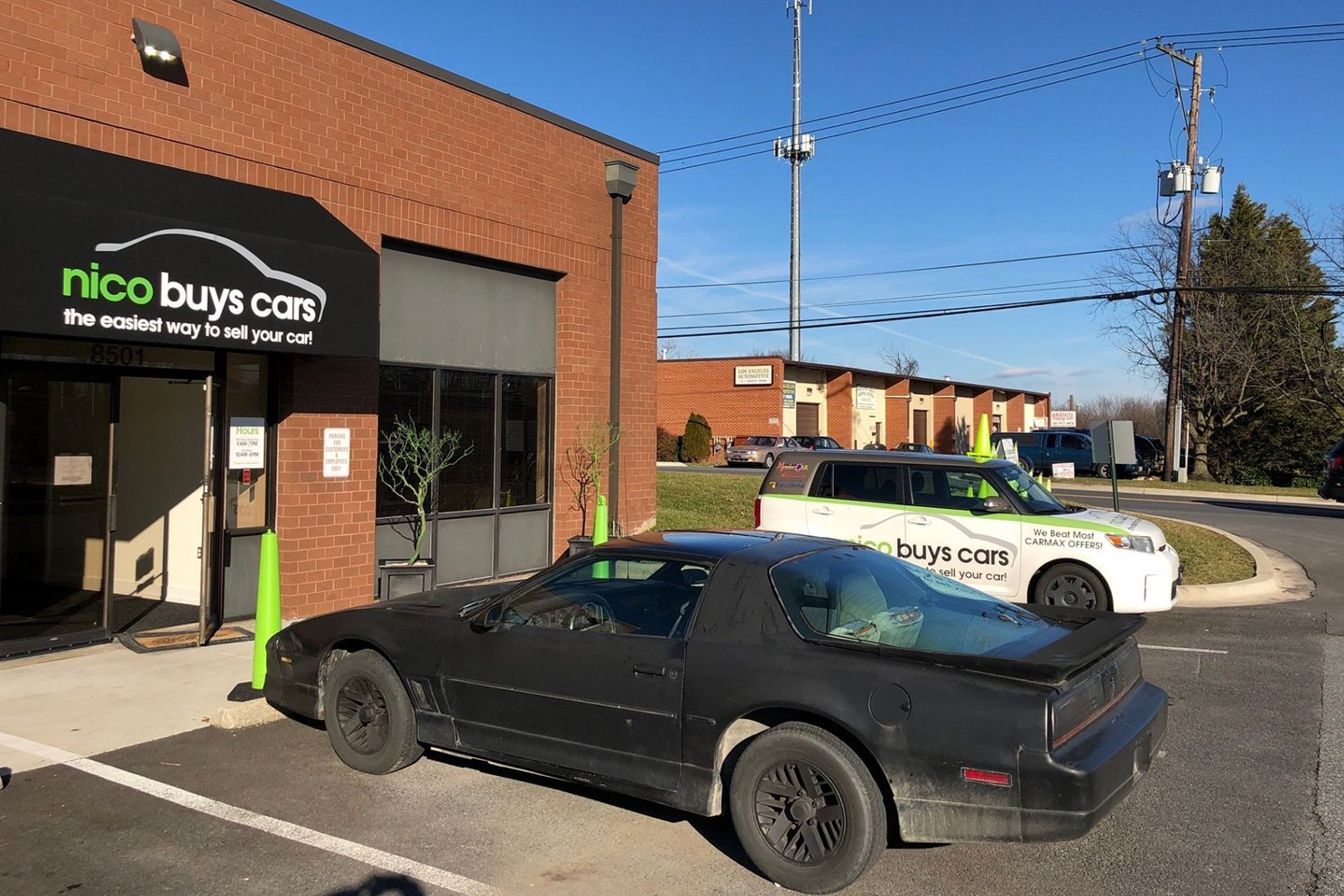 Black Car Parked Front of Nico Buys Cars