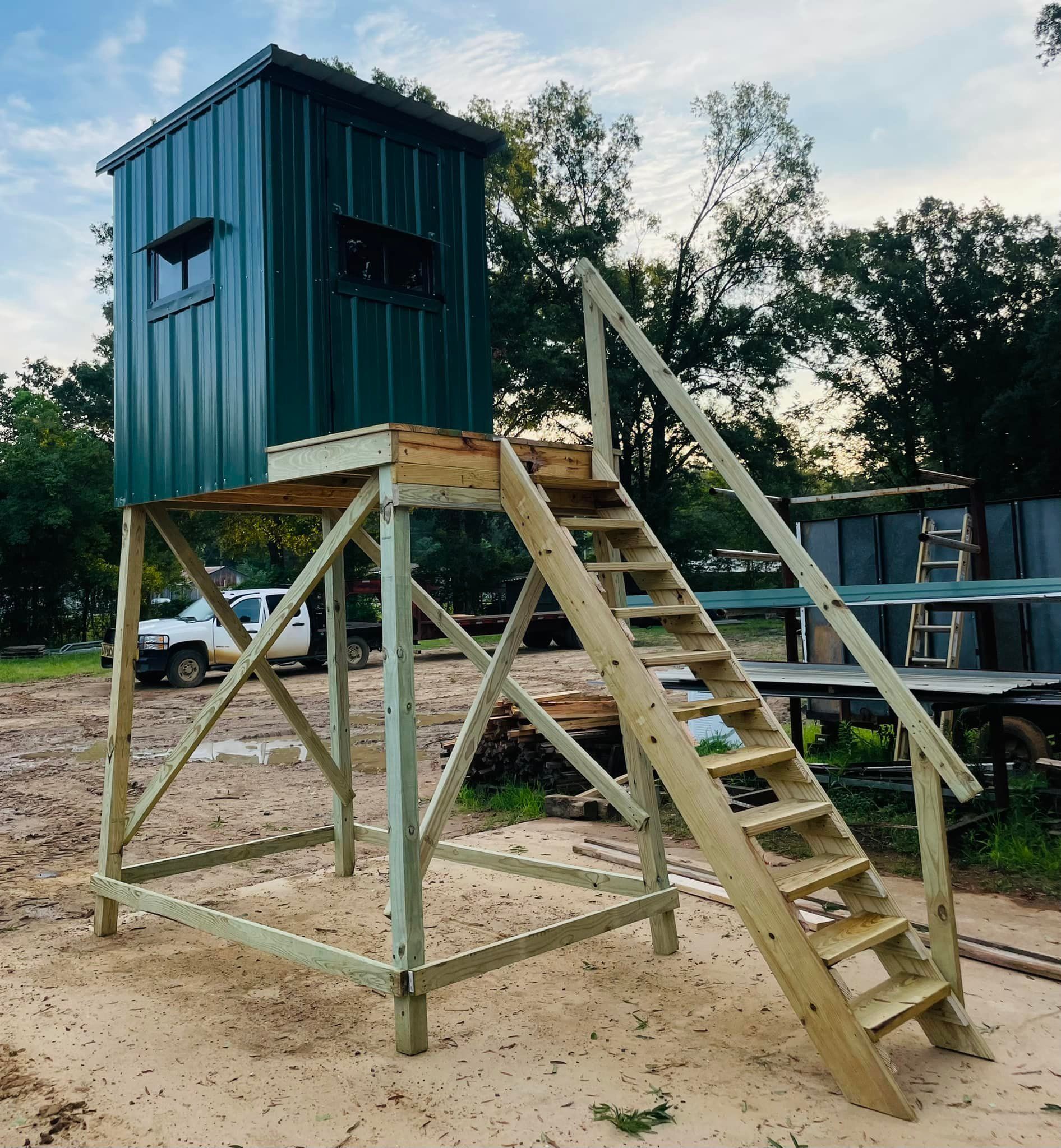 A wooden structure with stairs leading up to it