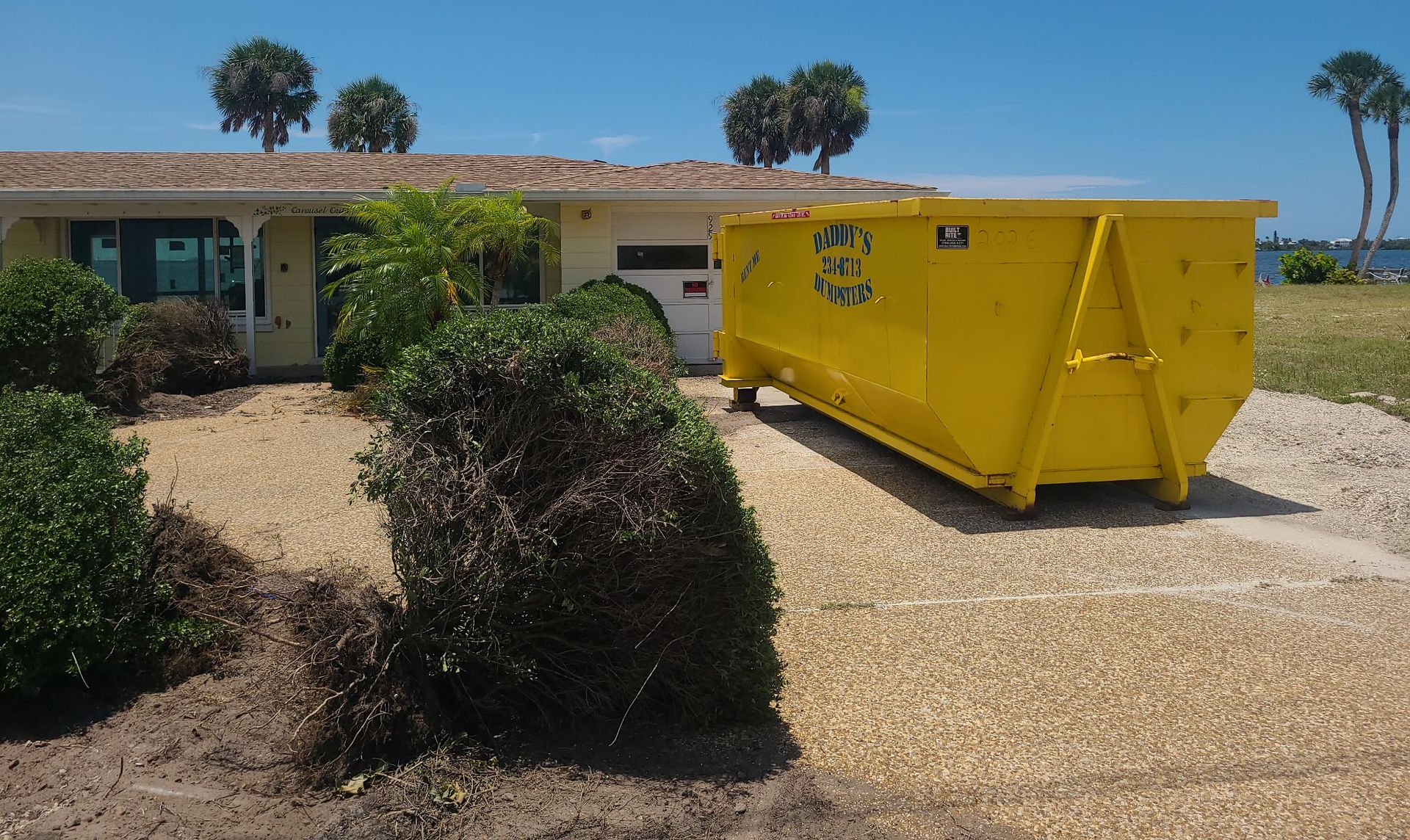 20 yard dumpster rental infographic showing dimensions and common uses including whole home cleanout
