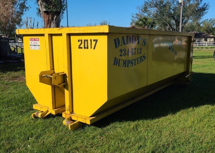 20-yard dumpster rental in Port Charlotte ready for debris removal—great for remodeling or garage cleanouts