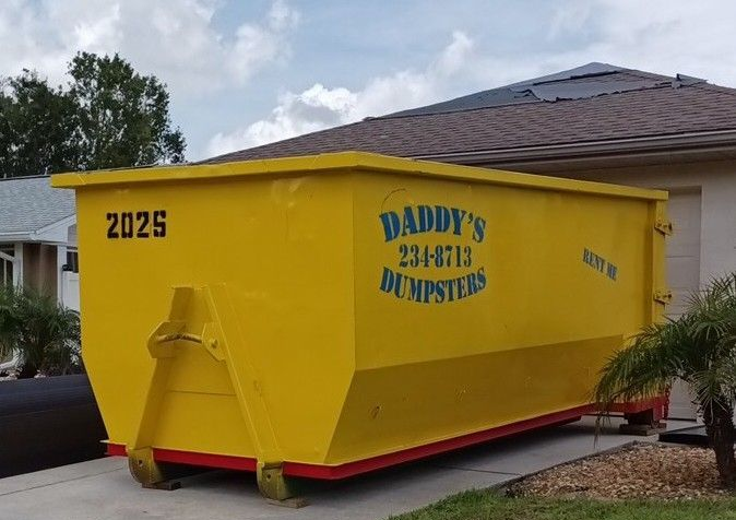 Yellow dumpster with