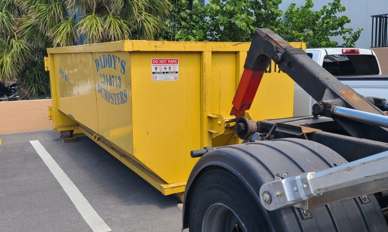 Yellow dumpster labeled