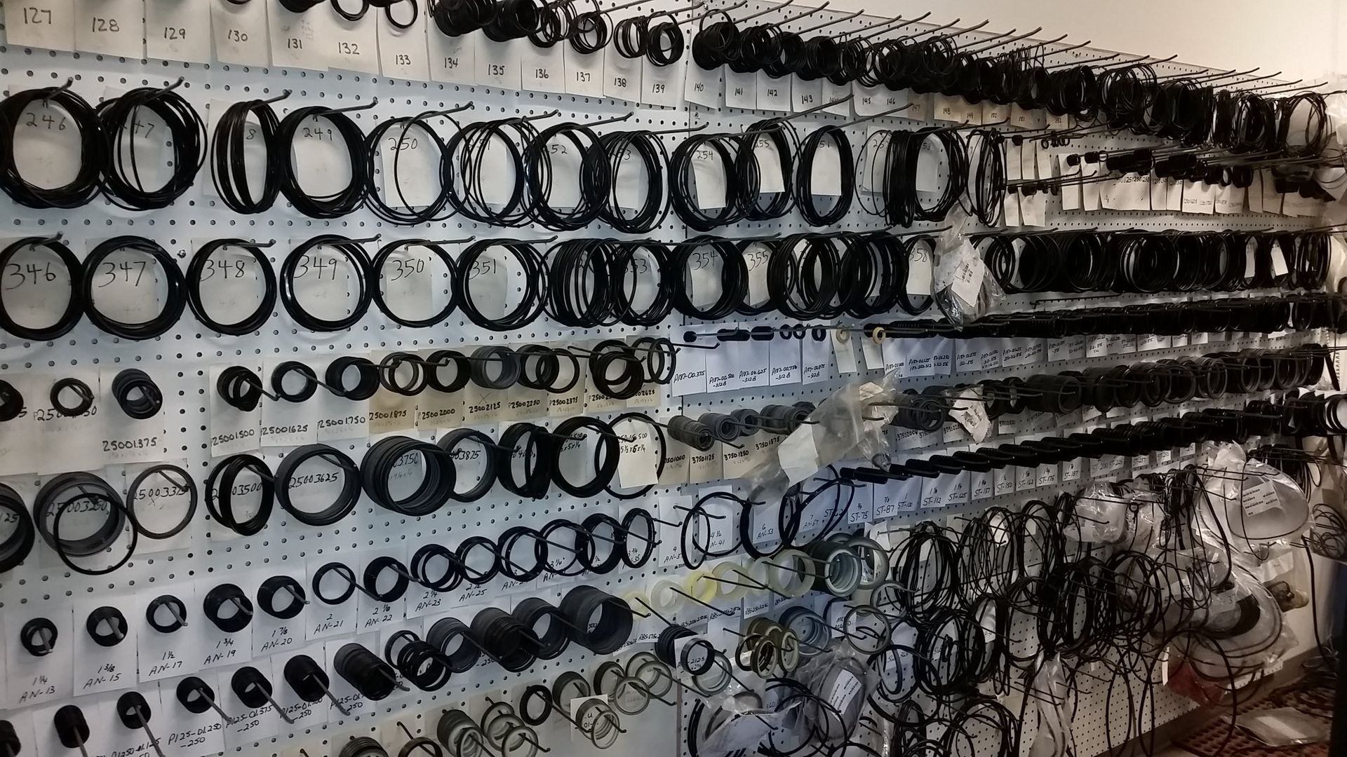 There are many different types of washers on the wall.