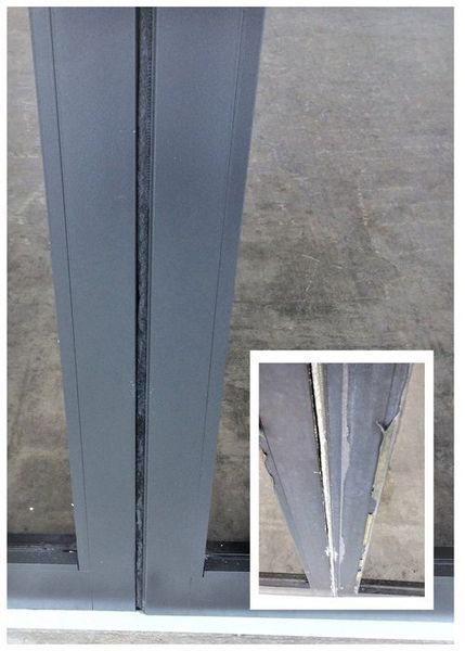 Gray metal support beam, with a close-up of the seam showing cracks.