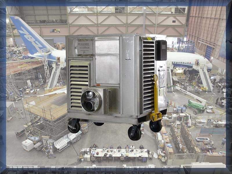 A boeing airplane is being built in a hangar