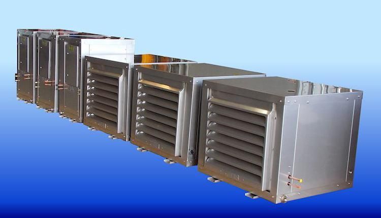 A row of stainless steel air conditioners on a blue background.