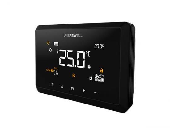 A black thermostat is sitting on a white surface.