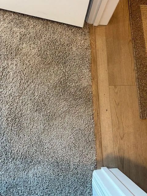 a repaired gray rug