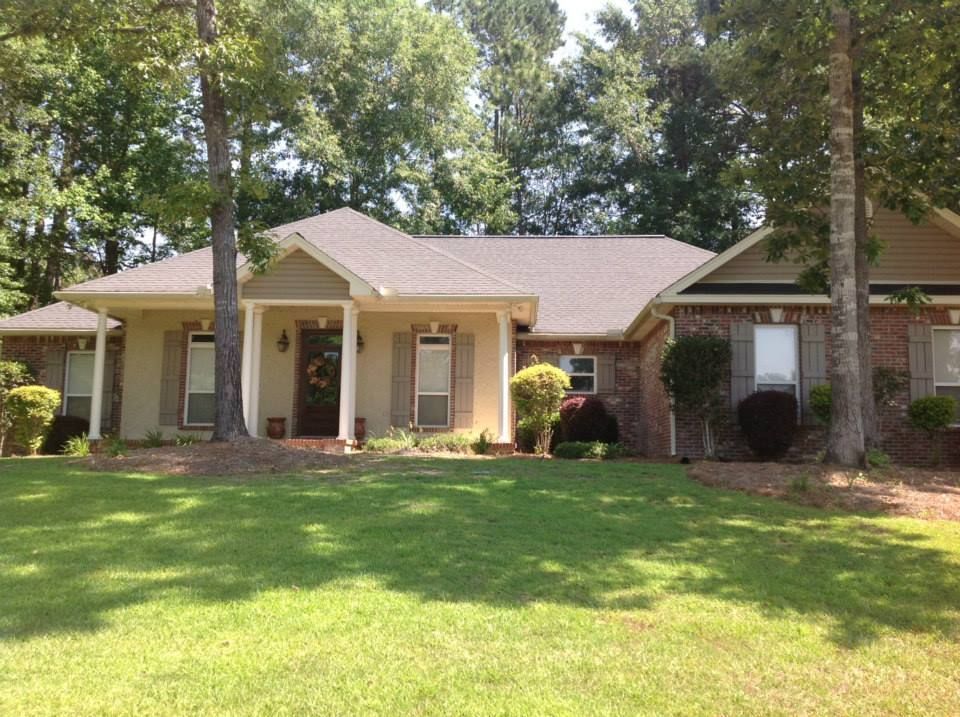 tww house with wide lawn