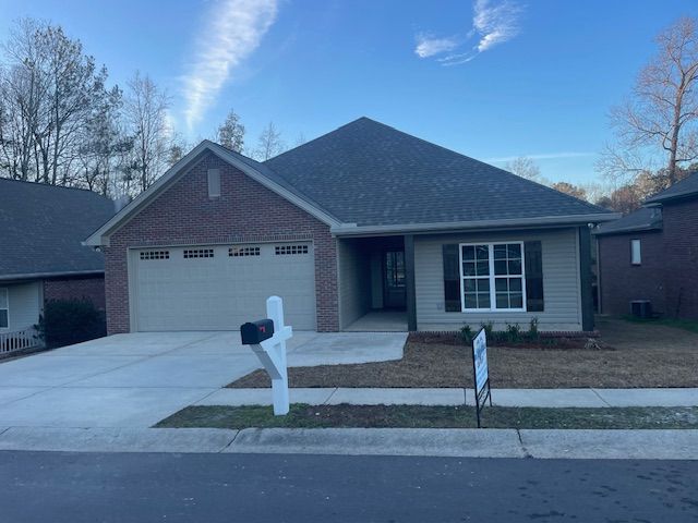 a house with a mailbox in front of it