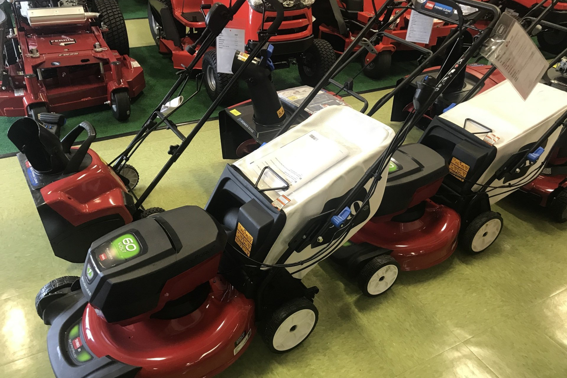 red and white mowers