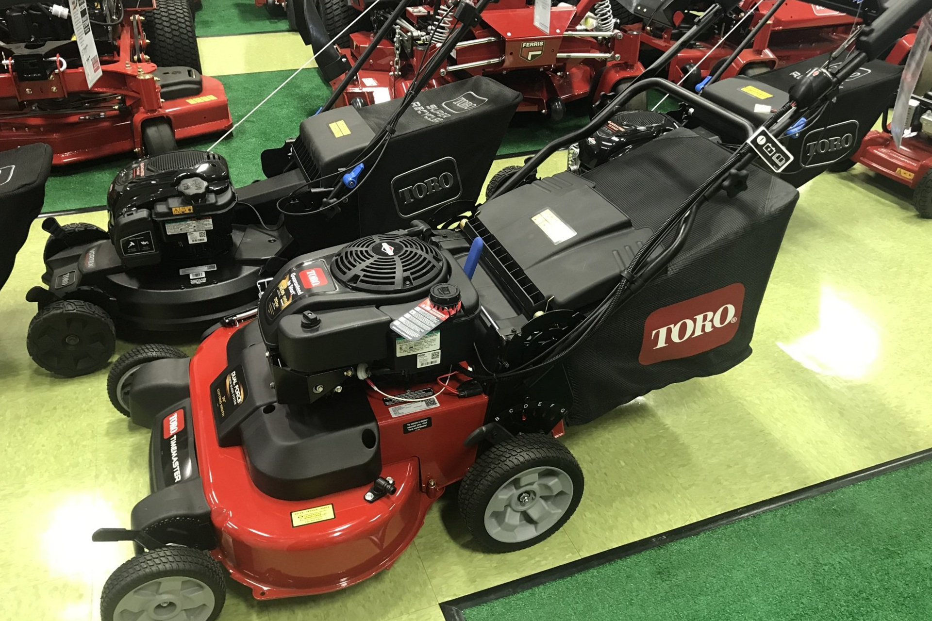 red and black mowers