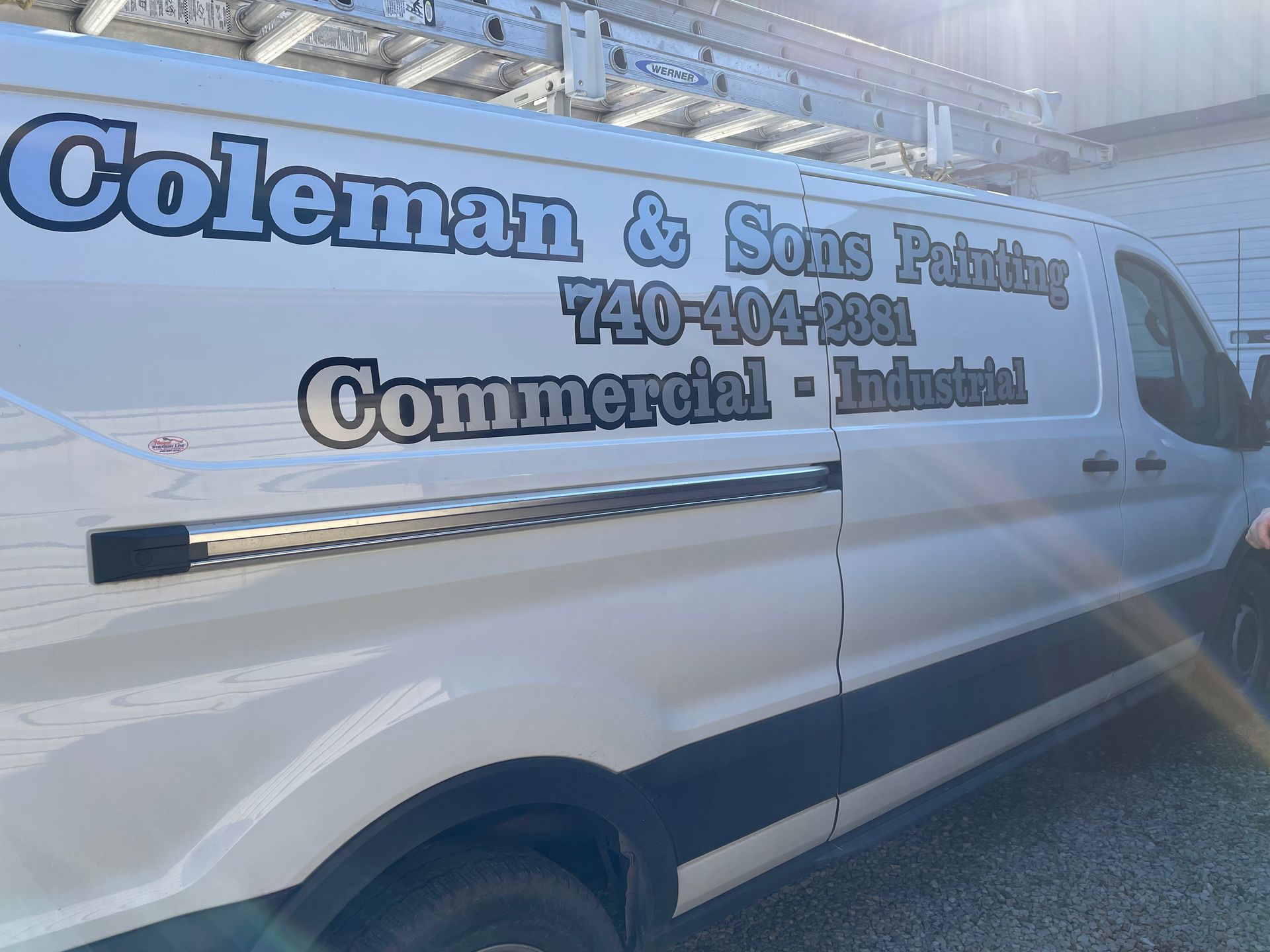 White van with “Coleman & Sons Painting” commercial lettering and phone number on the side.