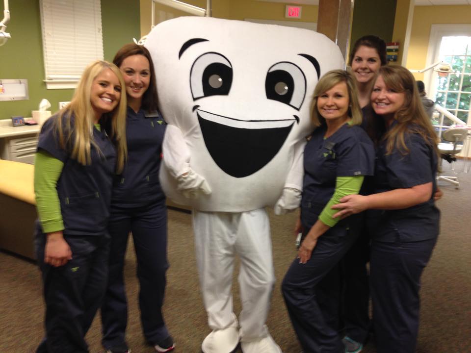 Staff with tooth mascot
