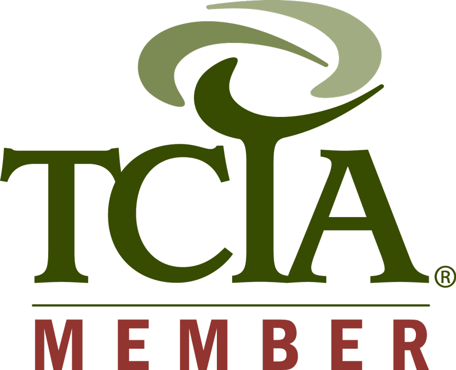 TCIA Member logo with stylized tree graphic. Dark green letters, brown tagline.