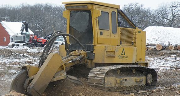 A yellow bulldozer with the letter a on the side