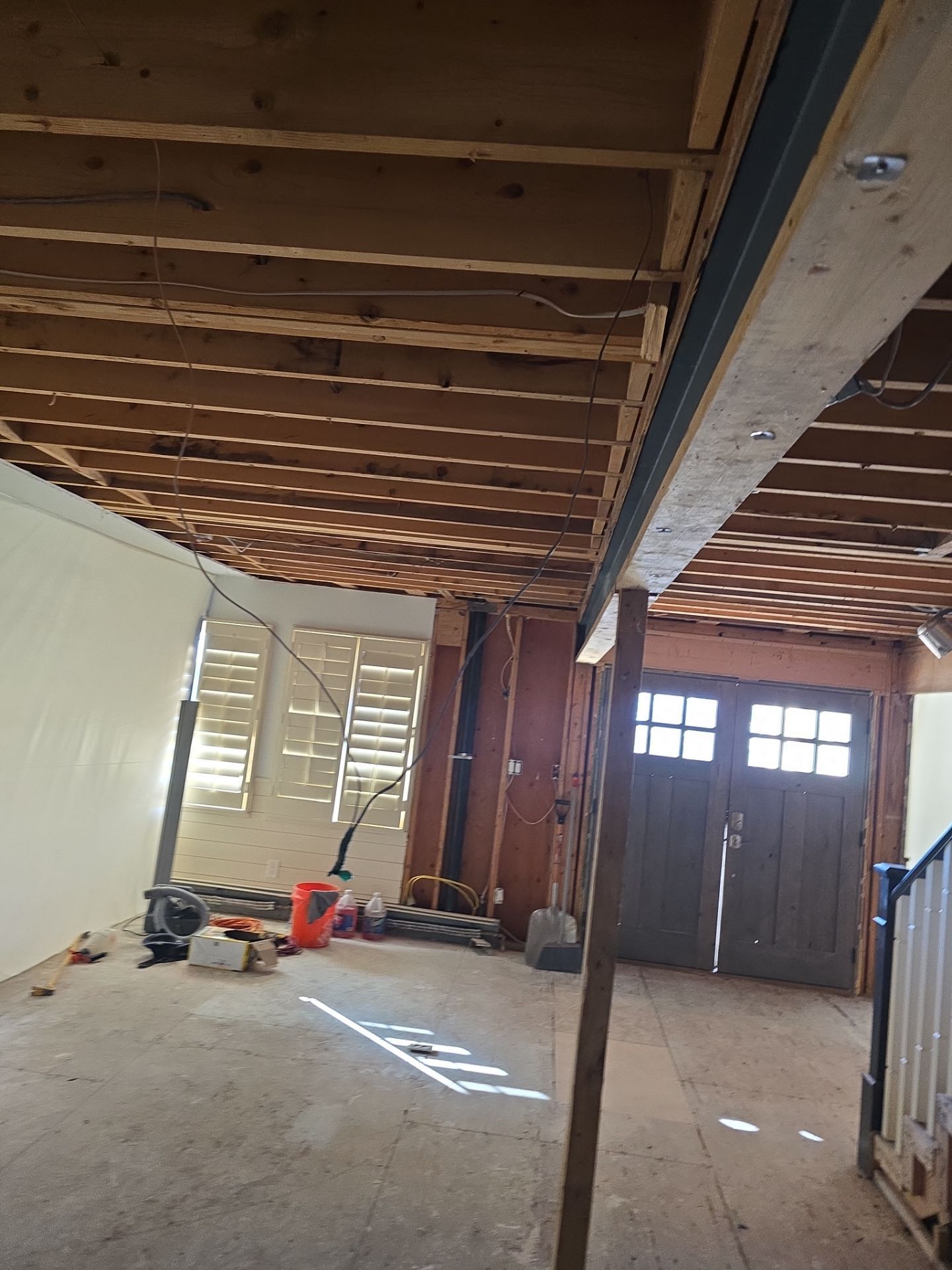A room with a wooden ceiling