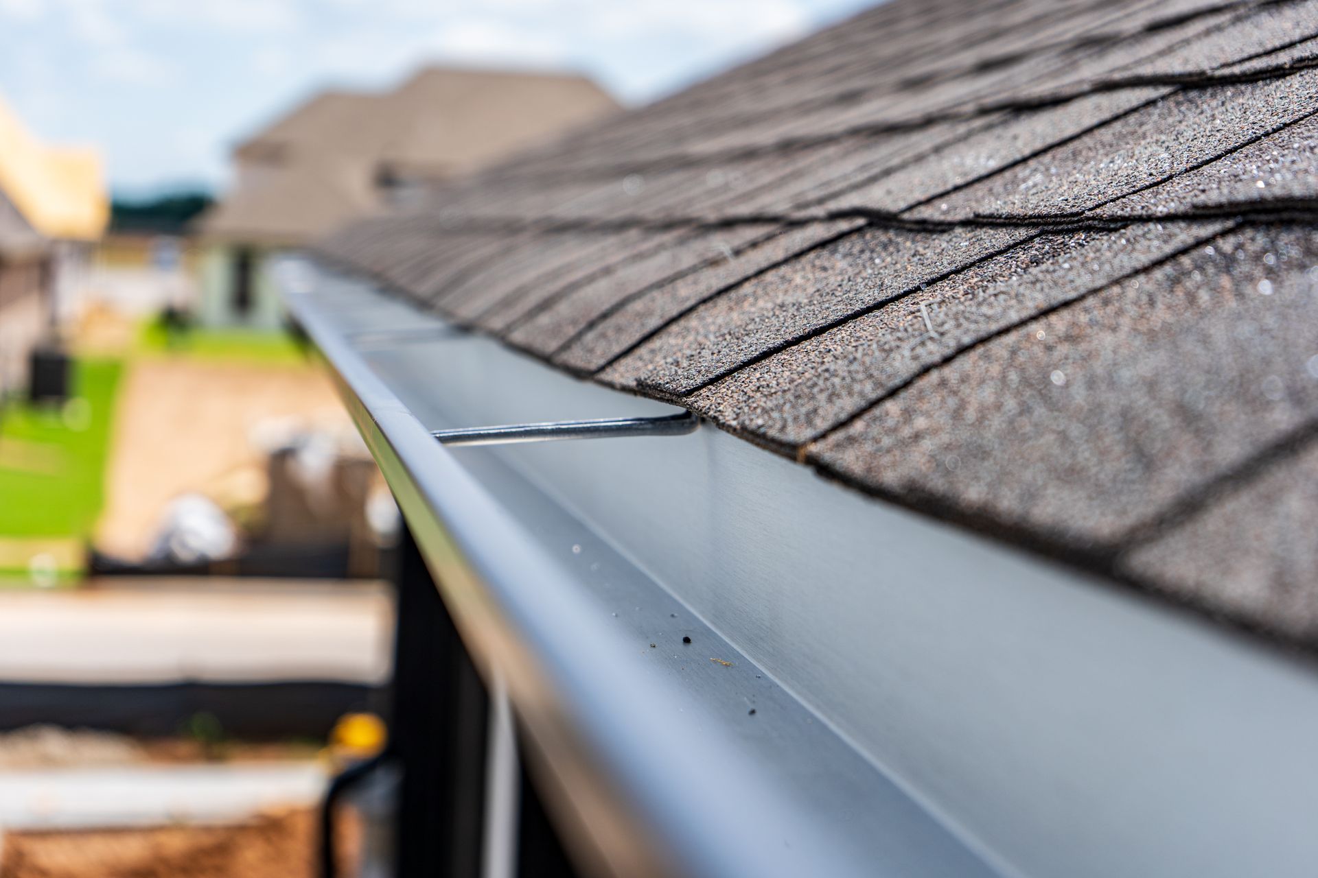 gutter falling off a house that needs repaired 