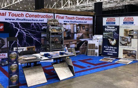 a Final Touch Construction and Remodeling booth