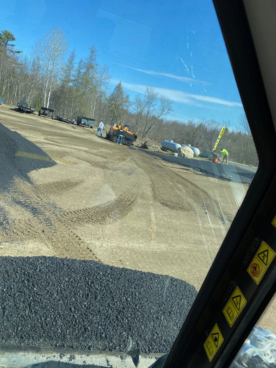 A view of a construction site from inside a vehicle