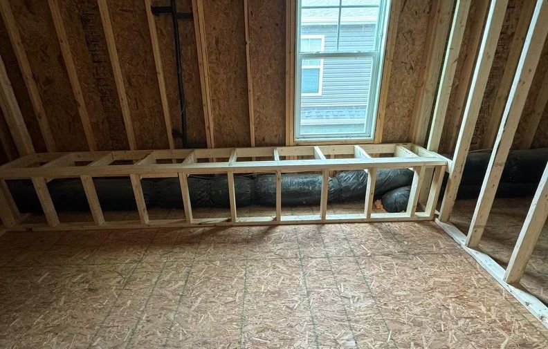 There is a window in the corner of the room.