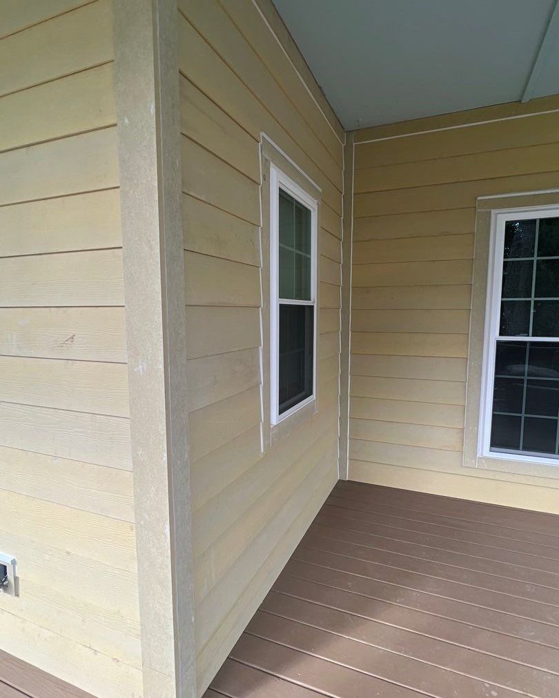 There is a window on the side of the house.