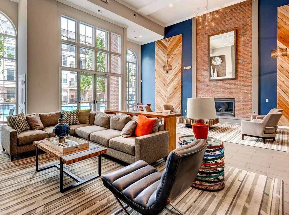 a living room filled with furniture and a fireplace