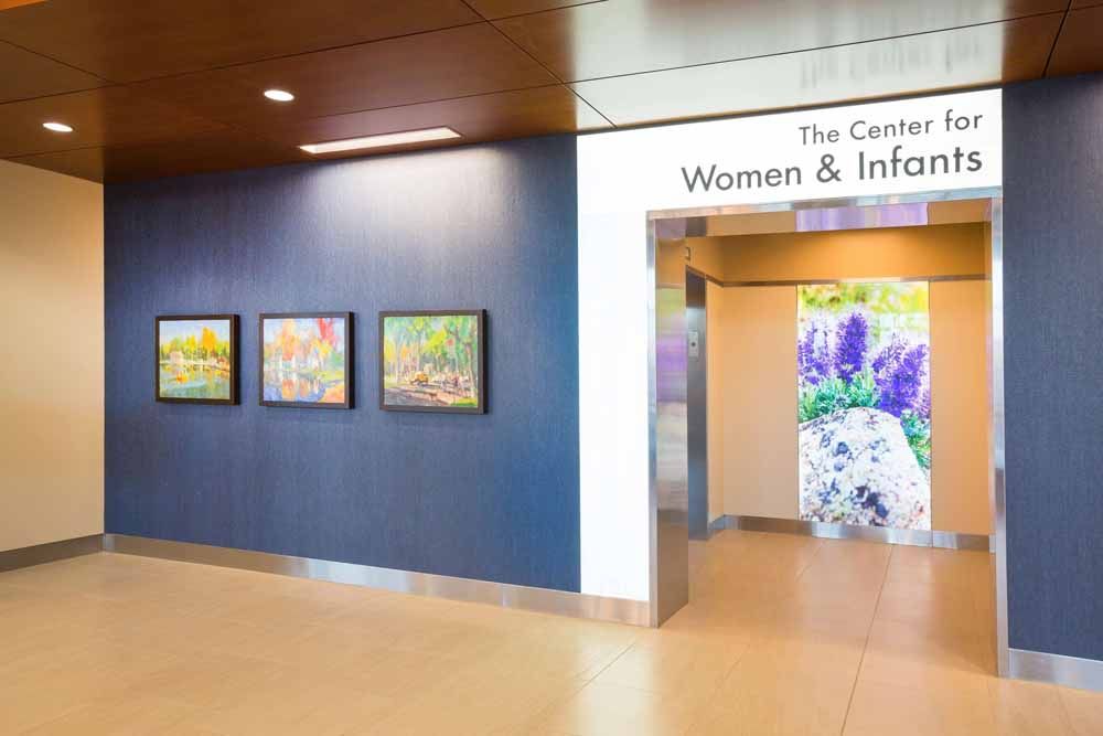 a hallway with a sign that says the center for women and infants