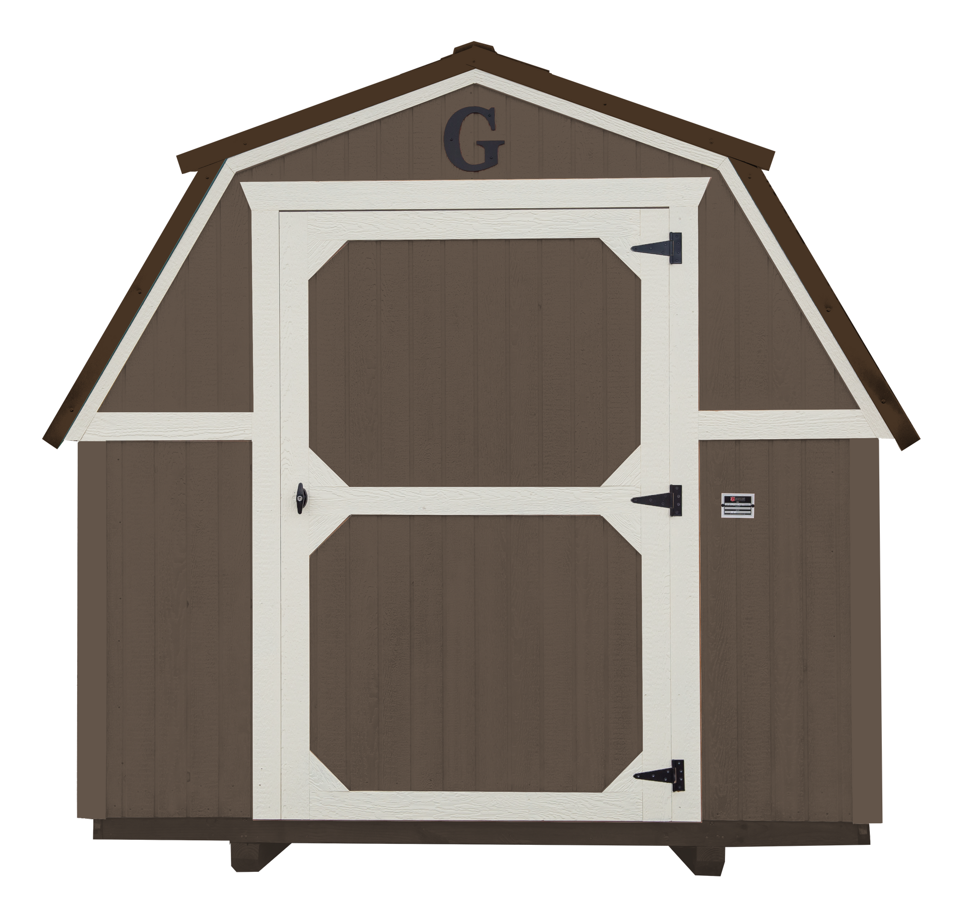 A brown and white barn with the letter g on the top