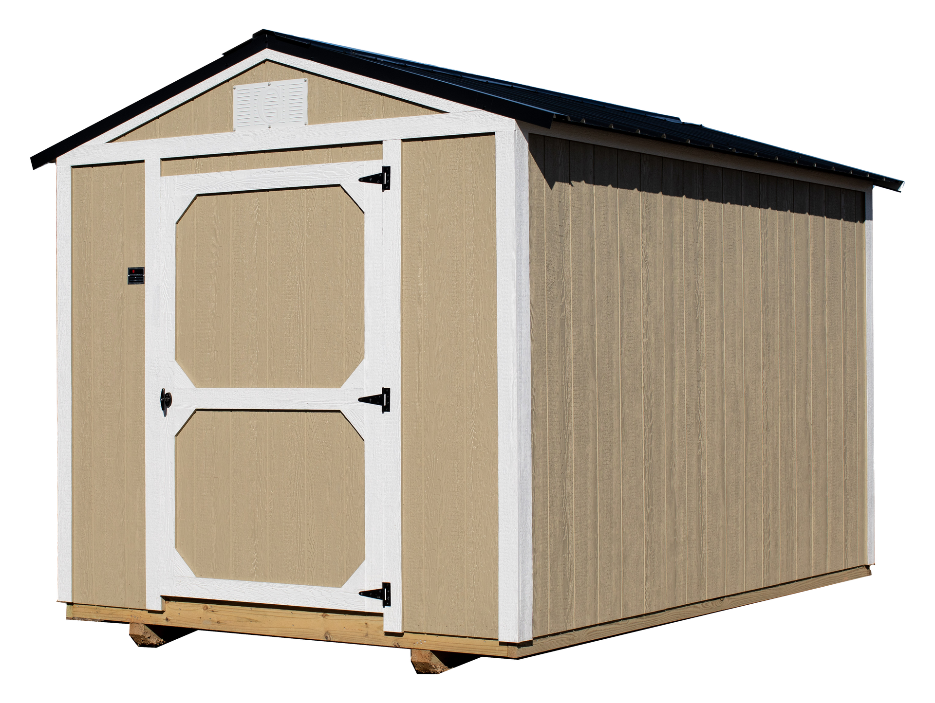 A tan and white shed with a black roof