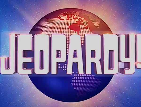 Jeopardy! logo with the word in white, and a blue and red globe background.