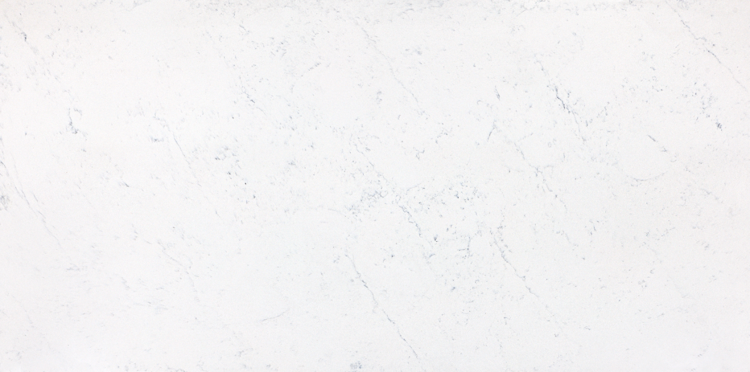 A close up of a white marble counter top.