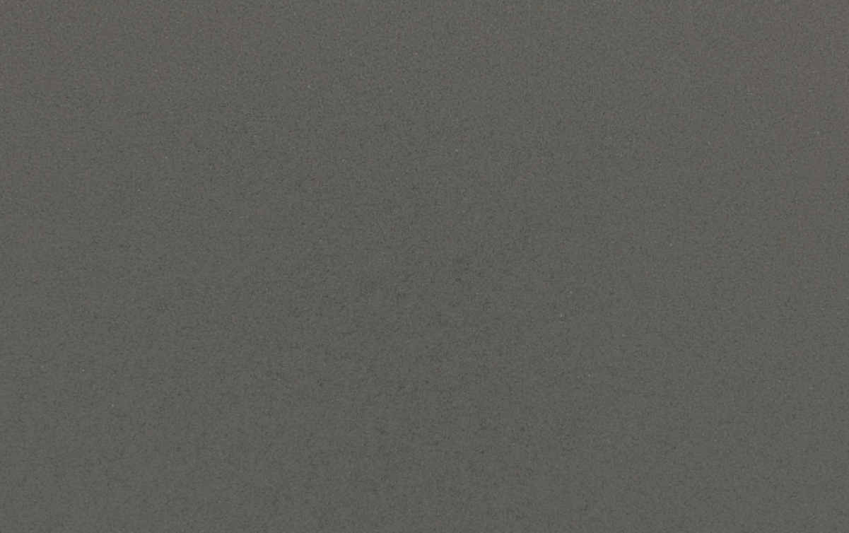A close up of a gray paper texture.
