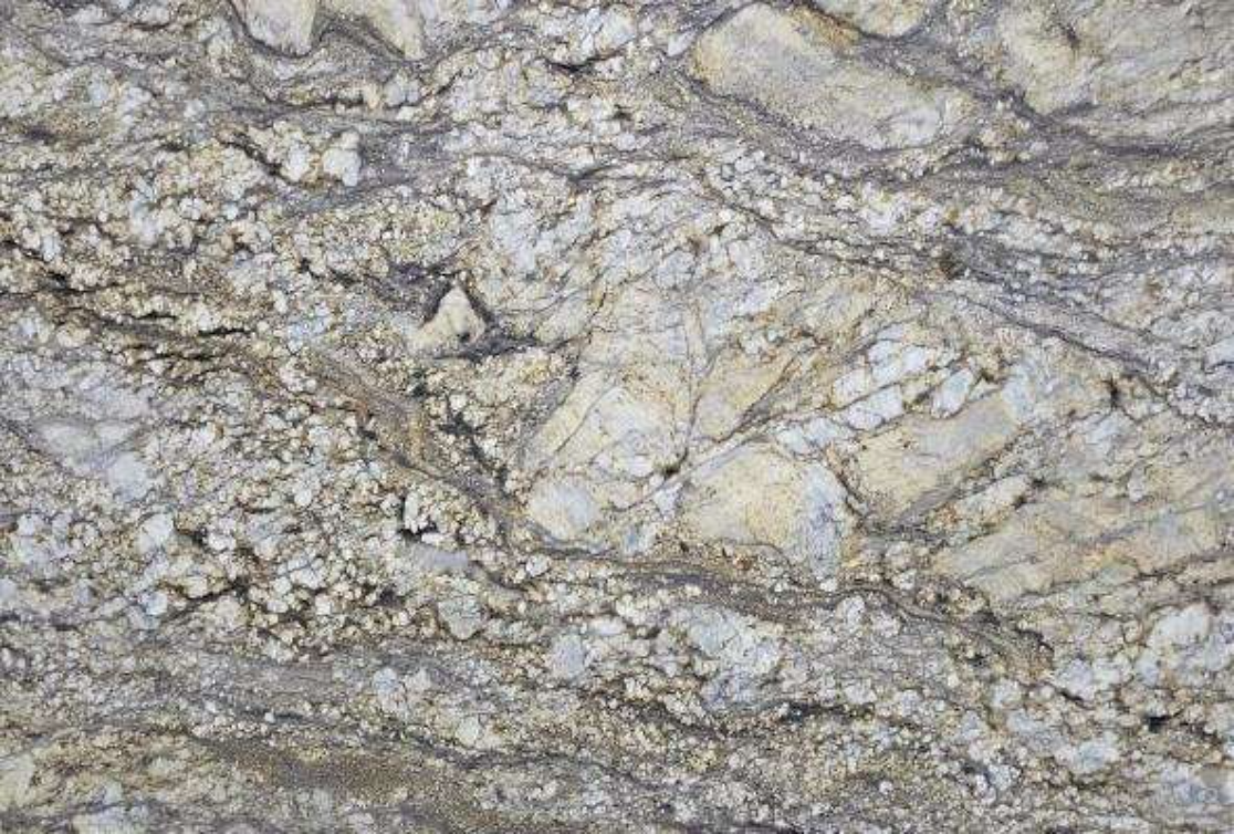 A close up of a granite counter top showing the texture of the stone.
