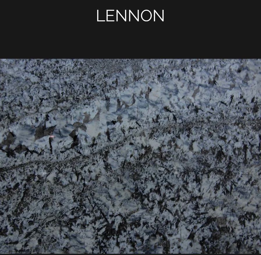 A close up of a rock with the word lennon on it.