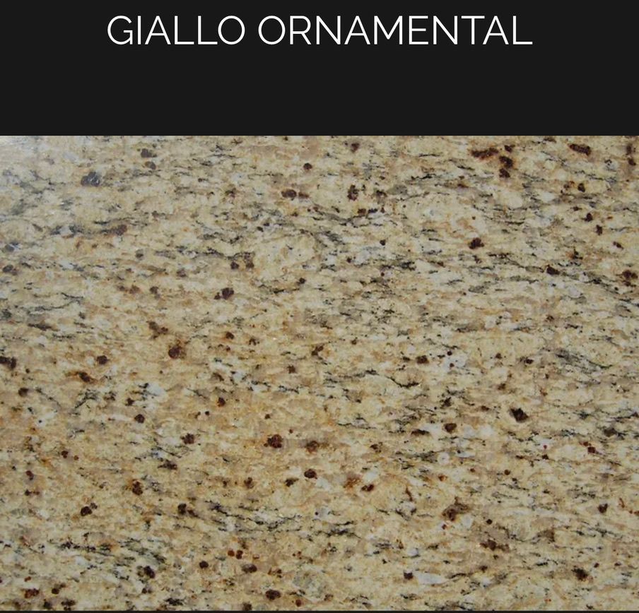 A close up of a yellow granite counter top that says giallo ornamental.