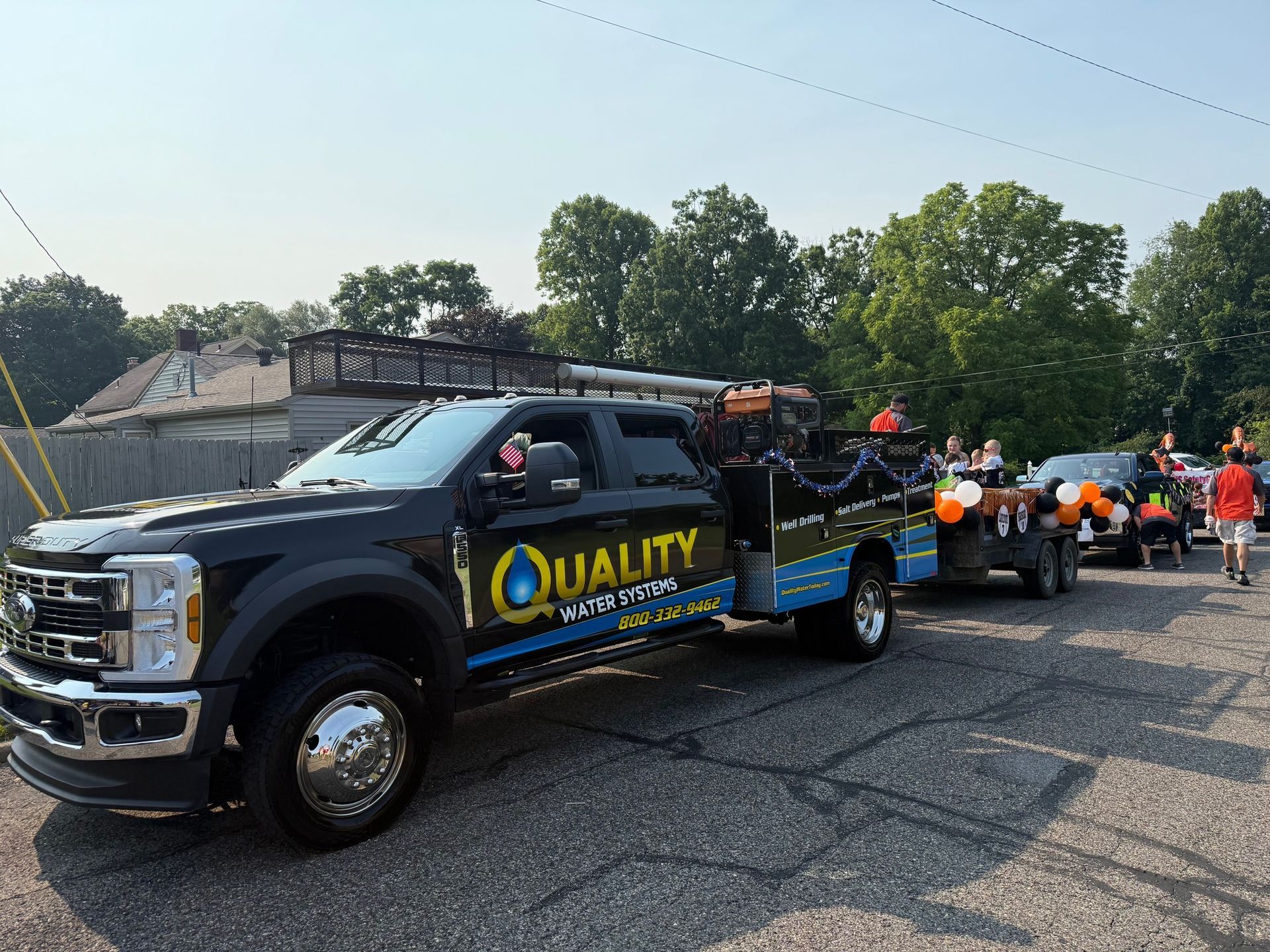 A black service truck with 