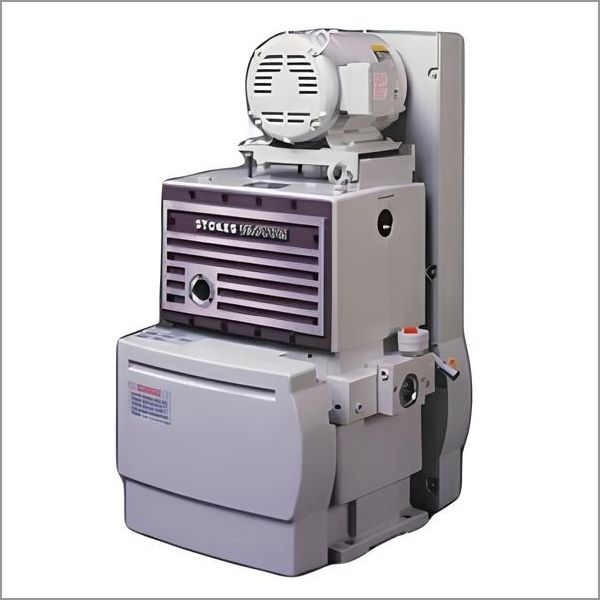 Gray industrial Stokes vacuum pump with electric motor.
