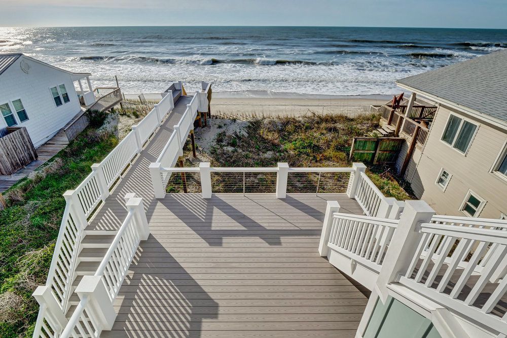 An aerial view of a deck overlooking the ocean.